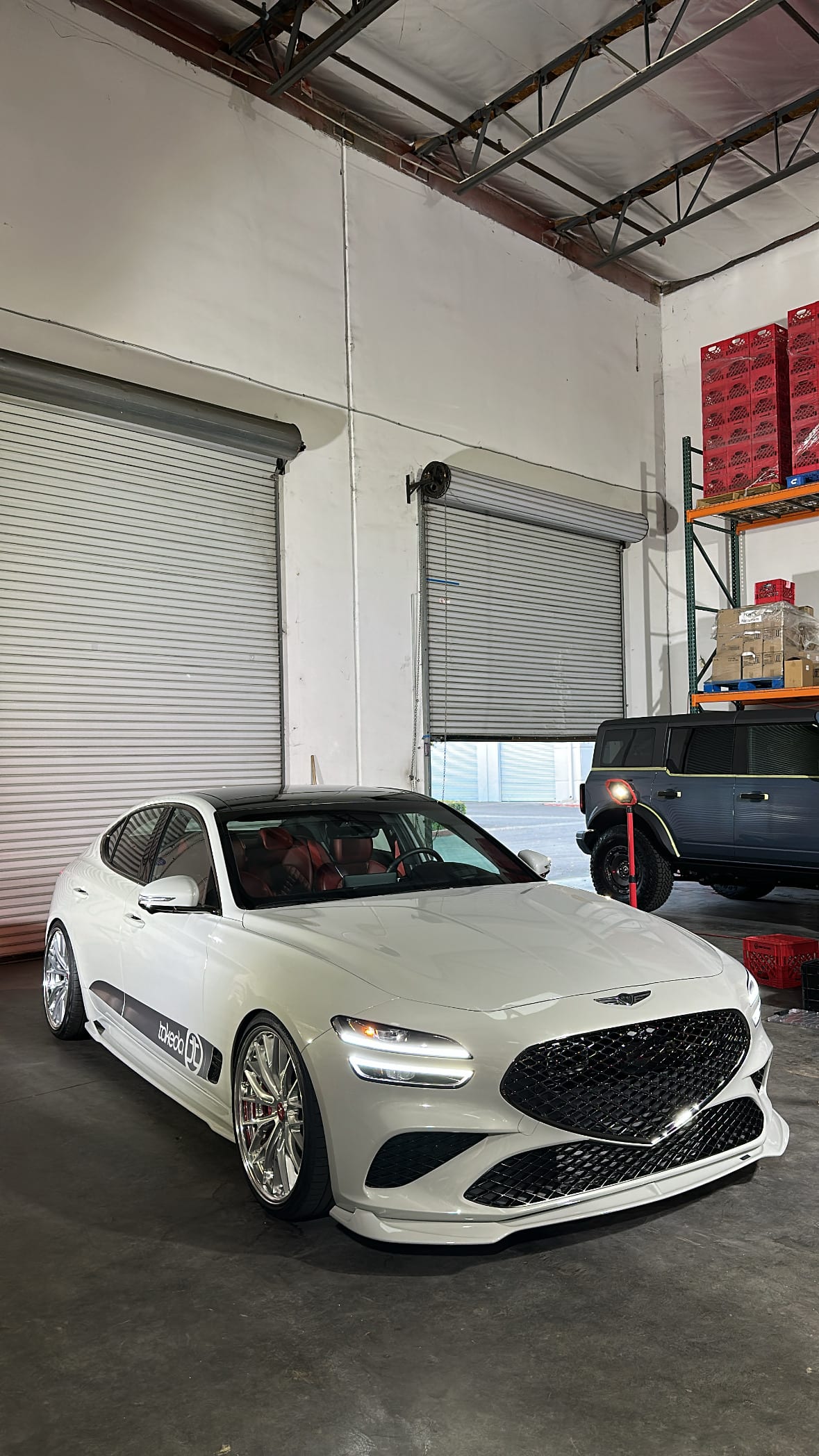 OMGBUILDS Genesis G70 with red interior detailed and corrected